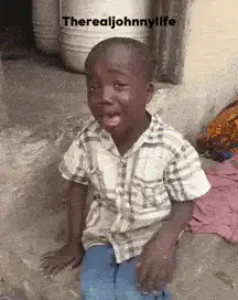 Crying boy laughing
