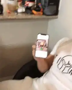 Man puts cheese slice on forehead