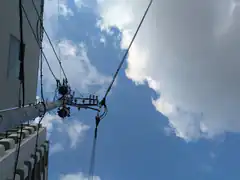 utility pole against blue sky