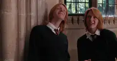 Fred and George Weasley laughing