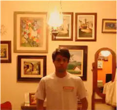 Man disappears and reappears with shirt
