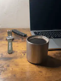 Coffee cup on wooden desk