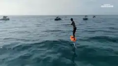 Man riding a hydrofoil surfboard
