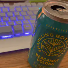 Sparkling Botanicals can with keyboard