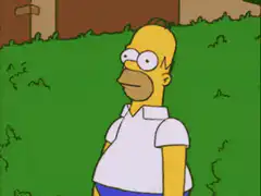 Homer Simpson walks through a hedge