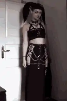 Goth girl posing in black outfit