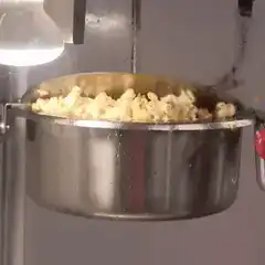 Popcorn machine dispensing popcorn
