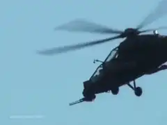 Apache helicopter flying and turning