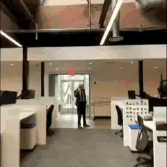 Cody Rhodes walks into office