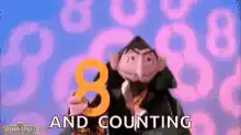 Count von Count holding number 8