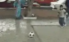 kid slips on wet pavement and falls