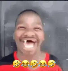 Boy laughing with missing tooth