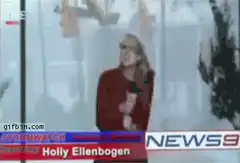 News reporter blown away by wind