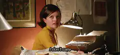 Girl at desk says I don't care