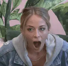 Woman with mouth open looking shocked