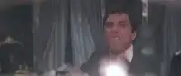 Tony Montana smoking cigar