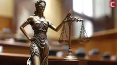 Lady Justice statue in courtroom