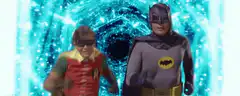 Batman and Robin dancing in a blue tunnel