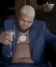 The Weeknd drinking wine and nodding off