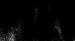 white particles falling on black background