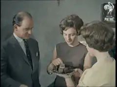 Couple and man eating chocolates