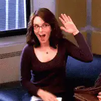 Woman waving and clapping excitedly