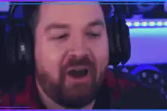 Man screaming into microphone