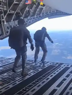 Soldier slips and falls out of cargo plane