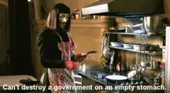 Frida Kahlo cooking with caption