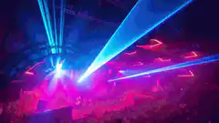 Blue and red laser lights at a concert