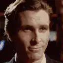 Christian Bale smirking