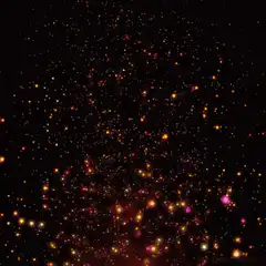 glowing particles rising in space