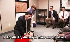 Michael Scott doing CPR to Stayin' Alive