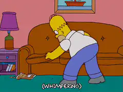 Homer Simpson Whimpering on Couch