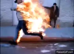 Man on fire running in panic