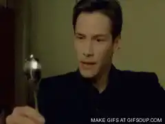 Neo bending a spoon with his mind