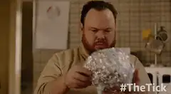 Man puts on tinfoil hat