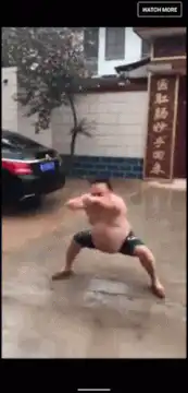 shirtless man doing martial arts moves
