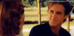 Ryan Gosling and Rachel McAdams smiling at each other