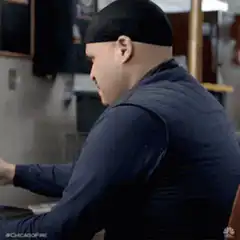 Chicago Fire officer turns and smirks