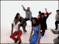 Group of people dancing in white room
