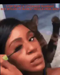 Woman applying mascara with cat