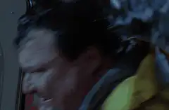 Man screaming in rain with DISCOURSE text