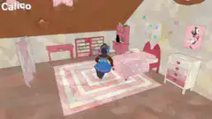 Girl and cats in pink bedroom