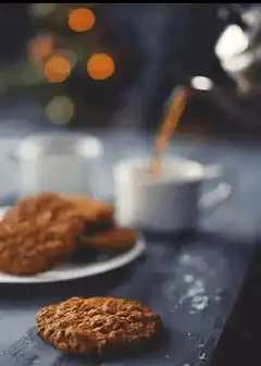 pouring tea with cookies