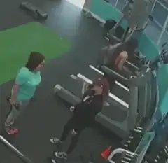 Woman falls off treadmill in gym