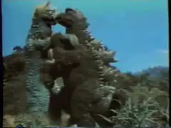 Godzilla throws King Caesar