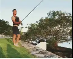 Man fishing on a cliff