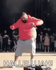 Man in red hoodie dancing and singing Hallelujah