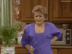 Rose Nylund confused with spray bottle